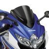 La bulle PUIG Z-Racing pour Suzuki GSX-R 1000 (07-08) est conçue pour les pilotes à la recherche de performance et d'esthétique. Ce modèle Z-Racing est spécialement pensé pour offrir une meilleure aérodynamique et réduire la résistance au vent lors de vos trajets à grande vitesse. Avec une hauteur plus basse et un design incliné, cette bulle permet de gagner en stabilité tout en améliorant l'aérodynamisme de votre moto. Fabriquée en polycarbonate de haute qualité, cette bulle est résistante aux impacts et aux rayures, ce qui garantit sa durabilité au fil du temps. La technologie de fabrication permet également une clarté optique exceptionnelle, vous offrant une visibilité optimale pendant vos trajets. Son design sportif et ses lignes agressives complètent l'aspect visuel de votre Suzuki GSX-R 1000, apportant une touche moderne et dynamique. L'installation de la bulle PUIG Z-Racing est simple et rapide, parfaitement adaptée à votre Suzuki GSX-R 1000 (07-08). Elle ne nécessite aucune modification de la moto et s'ajuste facilement avec les points de fixation d'origine, vous permettant ainsi de profiter rapidement des avantages de cet accessoire de performance. Que vous soyez sur circuit ou en route pour des trajets quotidiens, la bulle PUIG Z-Racing améliore votre confort de conduite en réduisant les turbulences et en offrant une protection aérodynamique accrue. Ajoutez du style à votre moto tout en optimisant votre expérience de conduite.